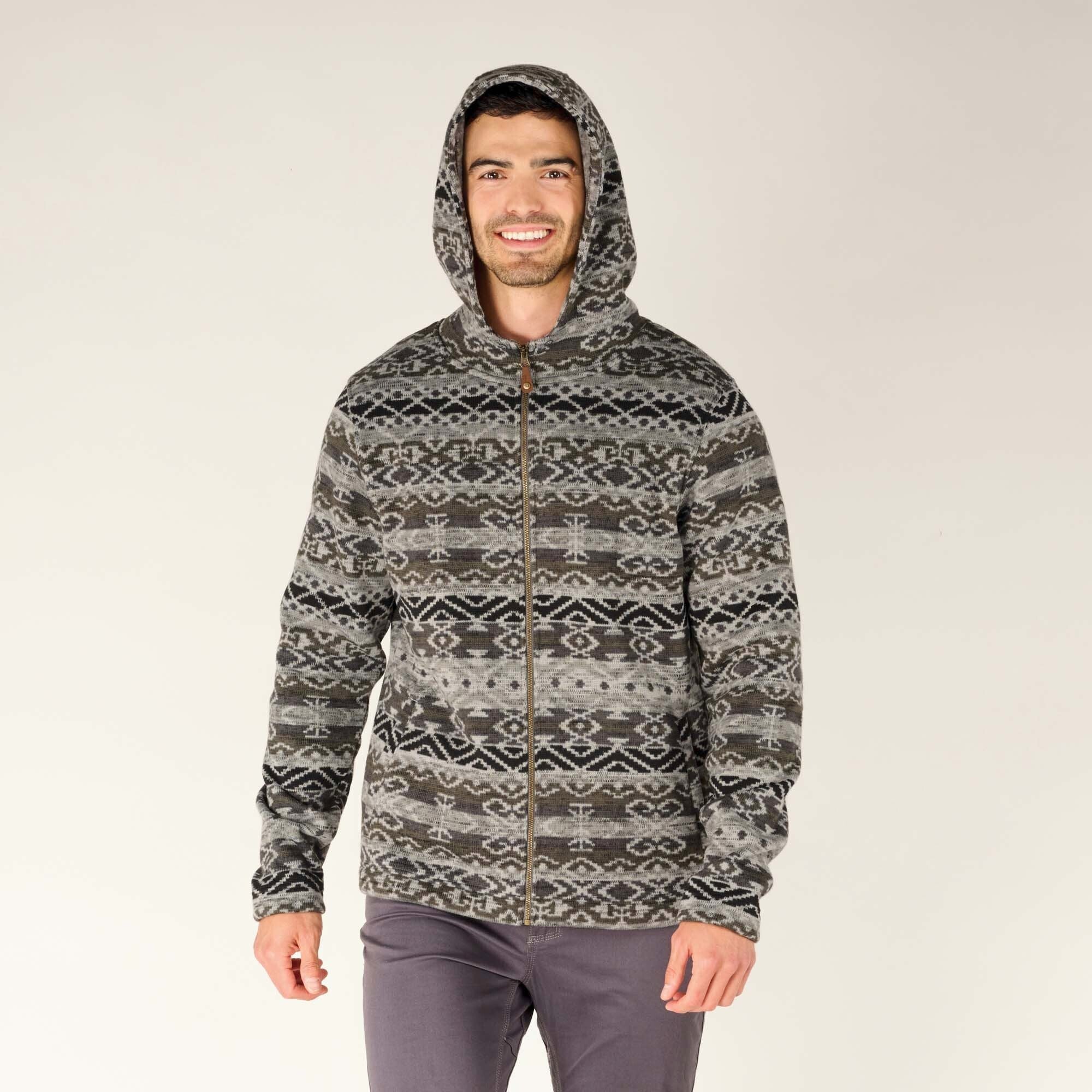 The model is facing forward with the hood up on the Sherpa Adventure Gear Bhutan Full Zip Hoodie in Grey, showcasing the cozy fit of the hood, which fully covers his head. The front zipper is fully zipped, and the high collar provides extra coverage.