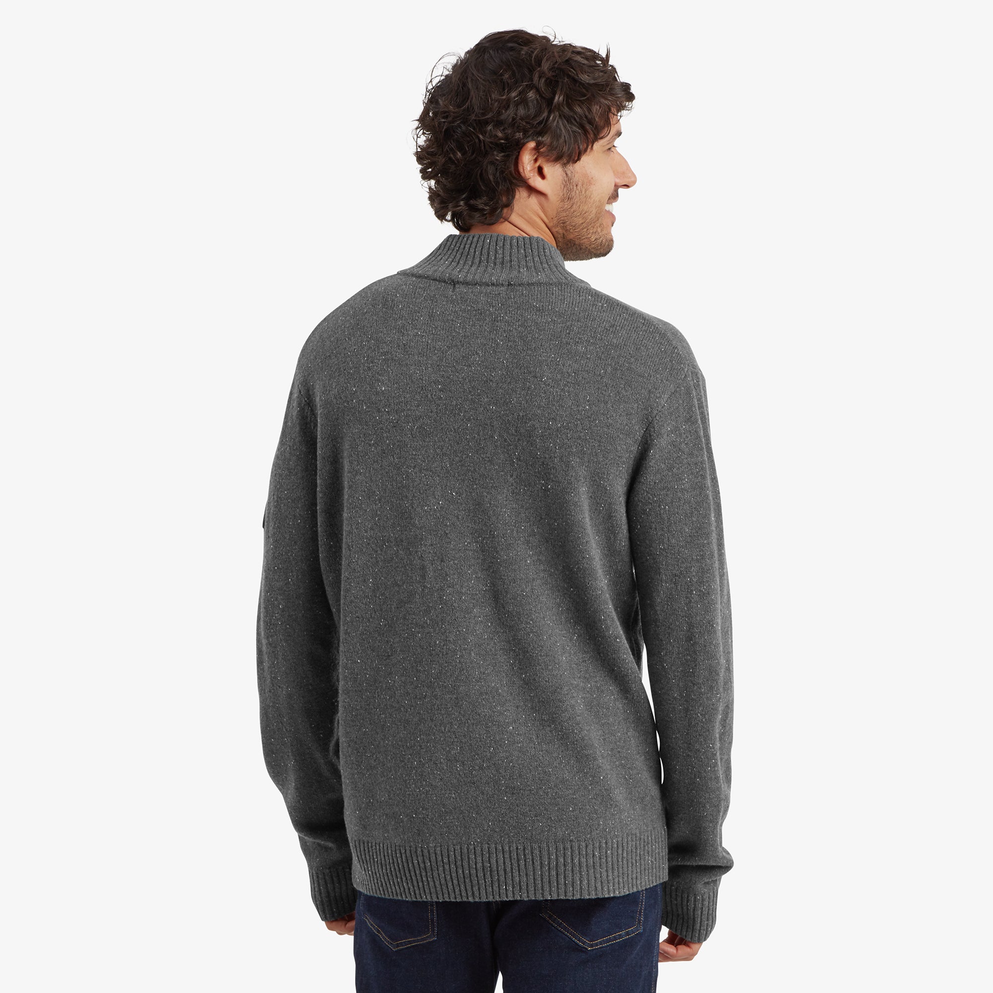 The back view of the Sherpa Adventure Gear Kangtega Quarter Zip Sweater in Grey, showcasing its seamless and clean design. The ribbed hem and cuffs ensure a fitted look while maintaining a relaxed silhouette.