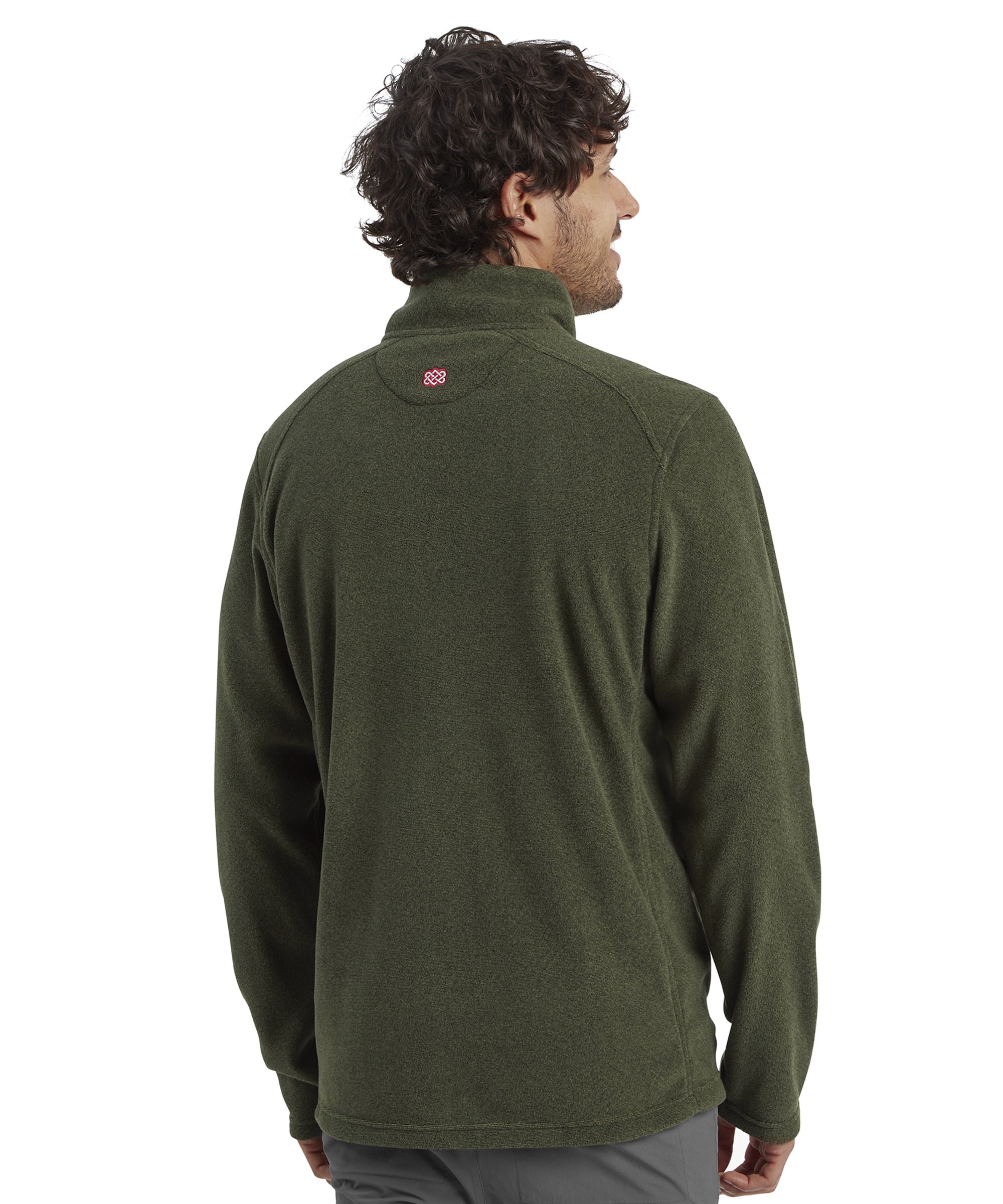 A back view of the Sherpa Adventure Gear Rolpa Eco Jacket in Green. The man is slightly turned, highlighting the embroidered Sherpa logo at the back collar and the smooth contour of the fabric.