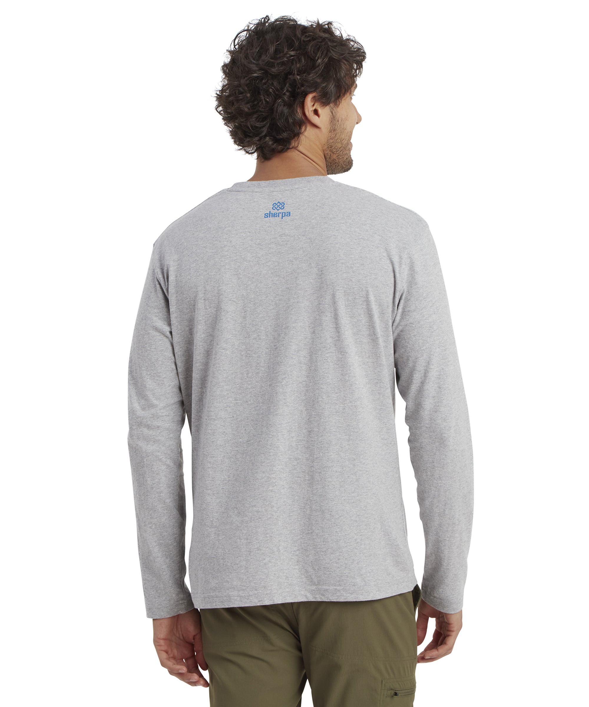 The rear of the Sherpa Adventure Gear Tarcho Long Sleeve T-Shirt in Grey features a minimalist design, with a subtle Sherpa logo printed in blue near the neckline. The plain grey fabric emphasises the clean and versatile style of the garment.