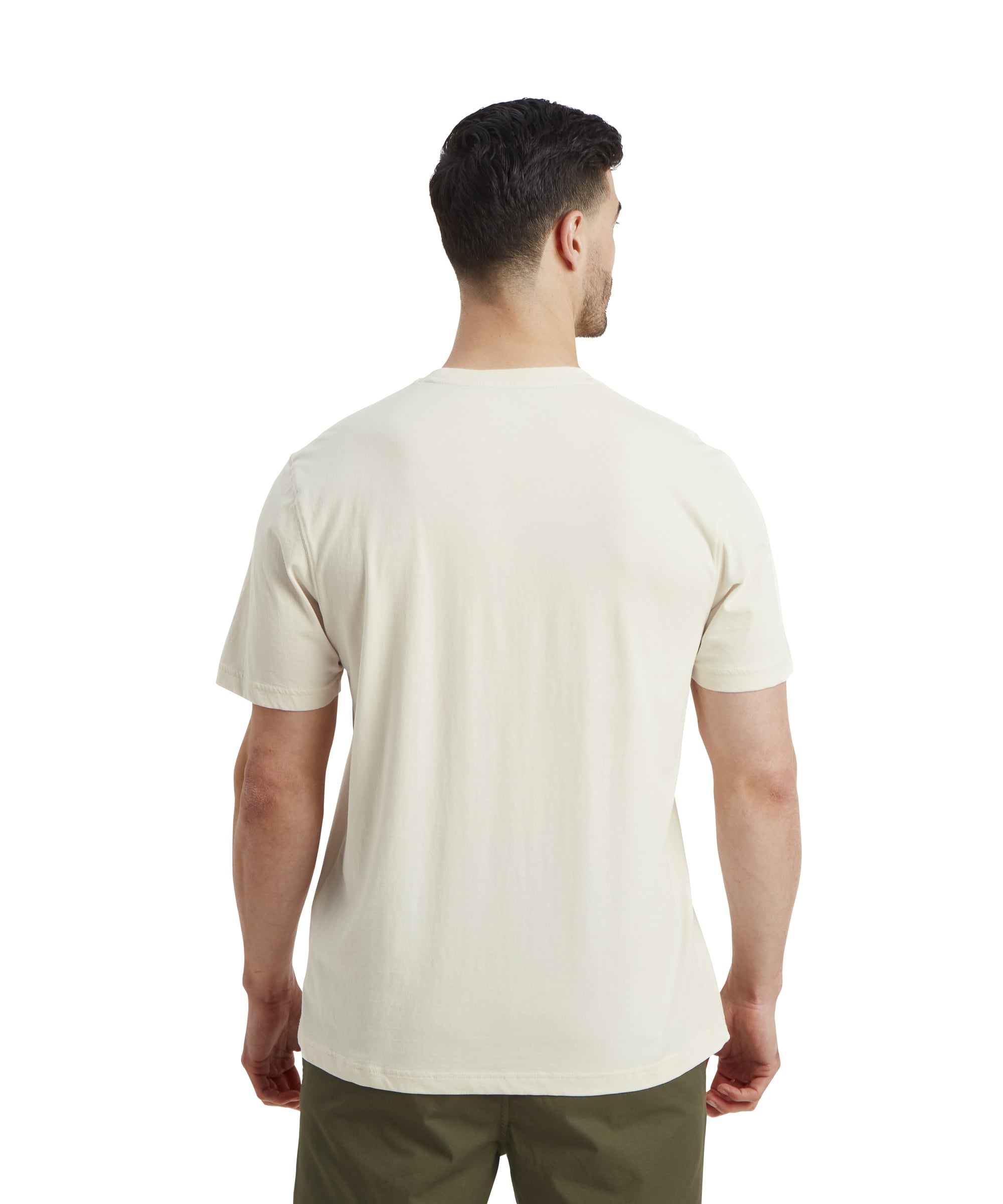 A back view of the same man wearing the Sherpa Adventure Gear Retro Knot T-Shirt in White. The plain back of the shirt is visible, along with the olive-green shorts. The man’s arms rest naturally by his sides.