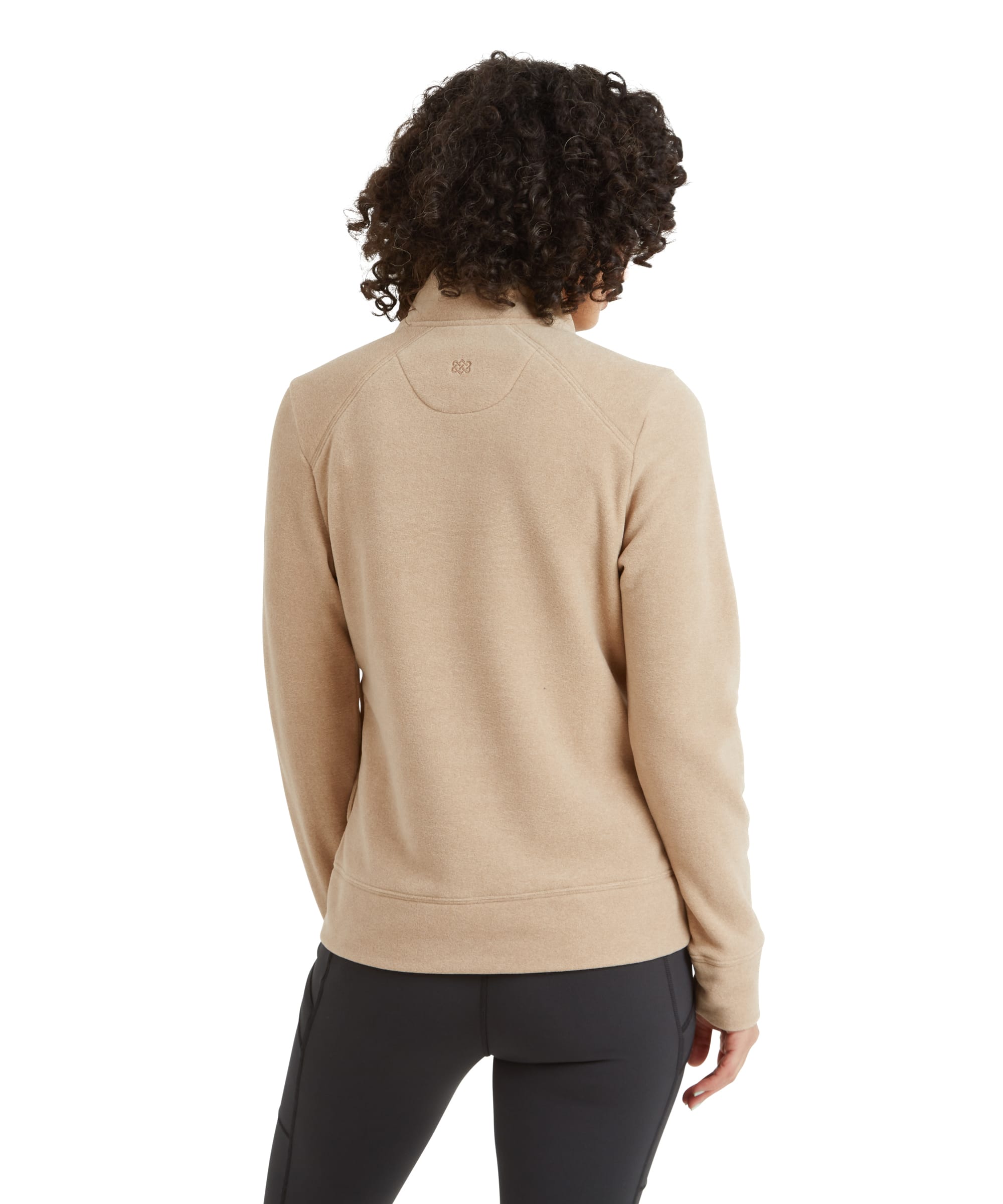 The back view of the Sherpa Adventure Gear Rolpa Eco Jacket in Beige, showcasing its clean, minimal design. A small logo detail is visible at the upper back near the collar, adding a touch of branding. The subtle stitching at the seams highlights the jacket’s construction and attention to detail.